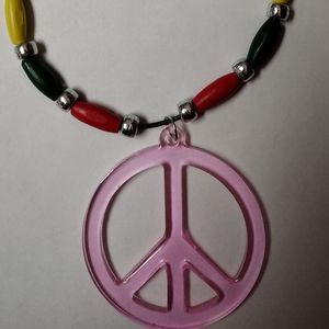 Resin and wood reggae style peace sign